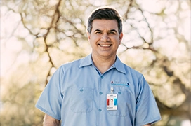 Technician smiling.