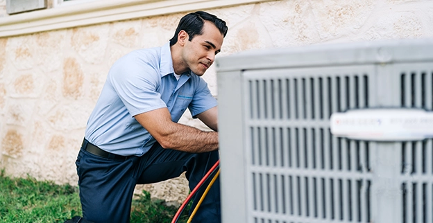 Aire Serv professional working outside.