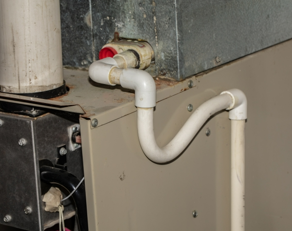 AC drain line in basement of a residential home