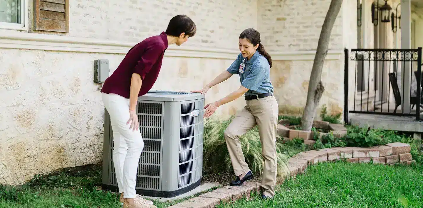 Emergency HVAC Repair professional investigating an issue.