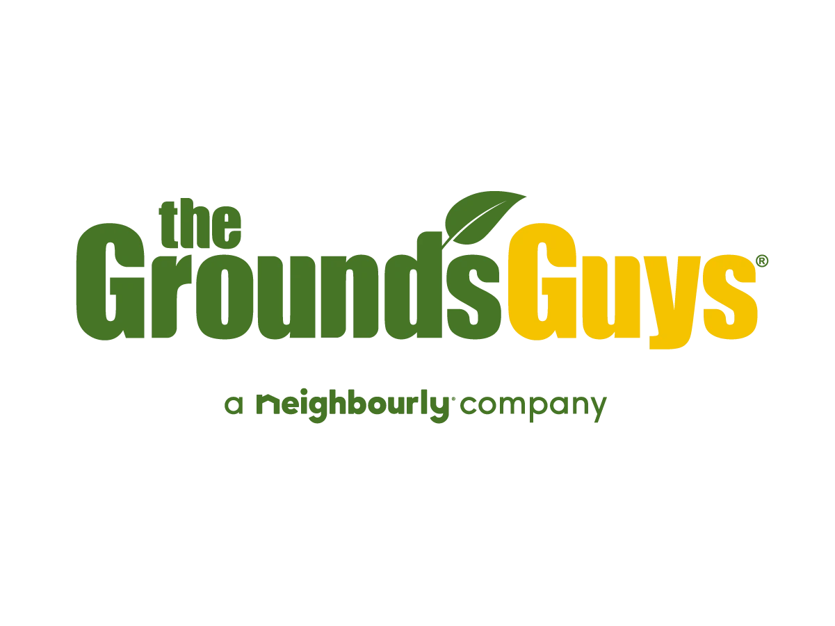 The Grounds Guys brand logo.